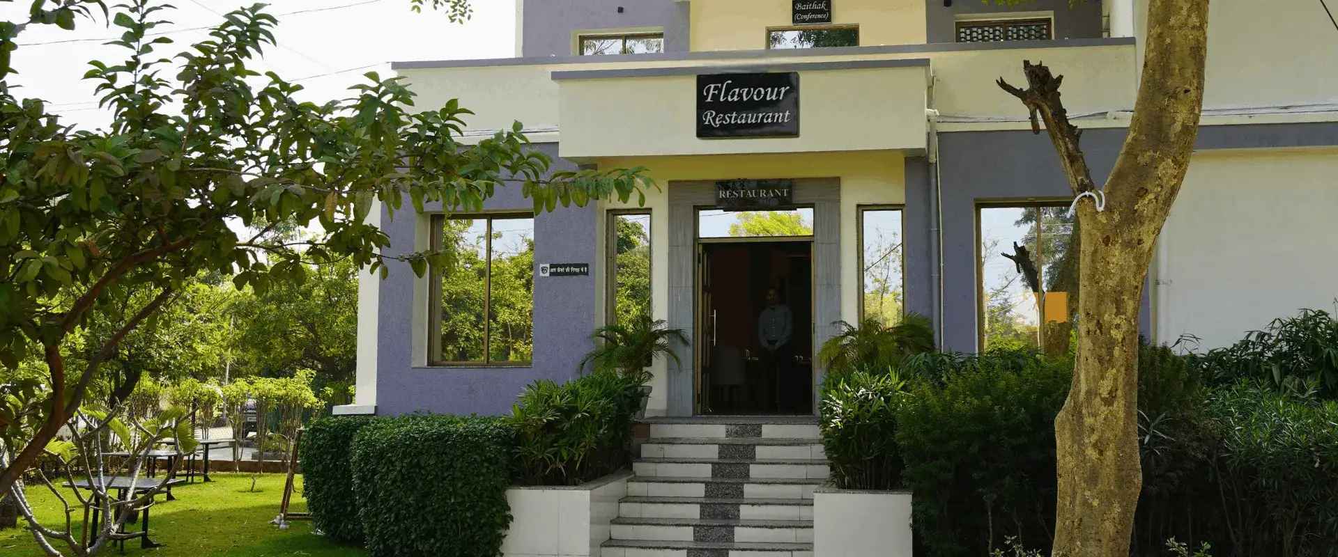 Nature-themed outdoor dining at Flavour Restaurant, Choice Resort Bhopal