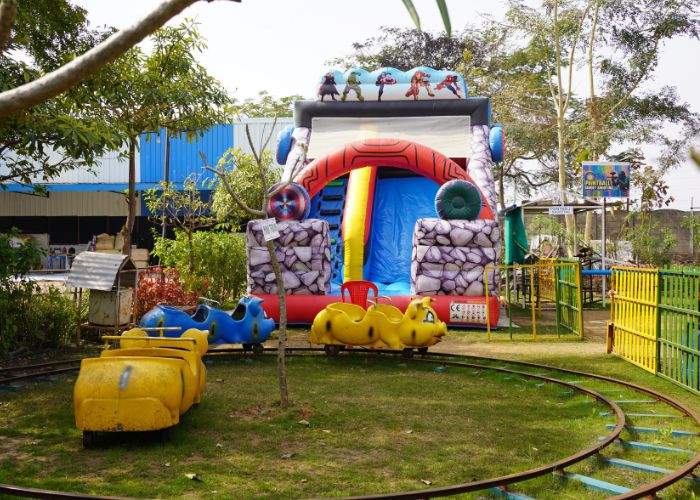 Inflatable slides and toy train at Choice Resort kids zone